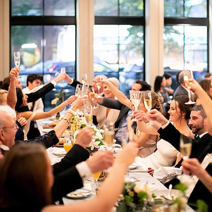 event photo of wedding toast